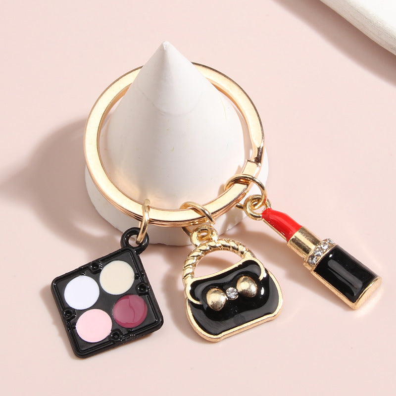 Wholesale 10PCS Zinc Alloy Shadow Disk Lipstick Bag Keychain